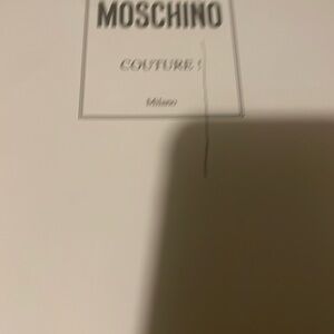 Moschino brand new embossed leather sneakers.
